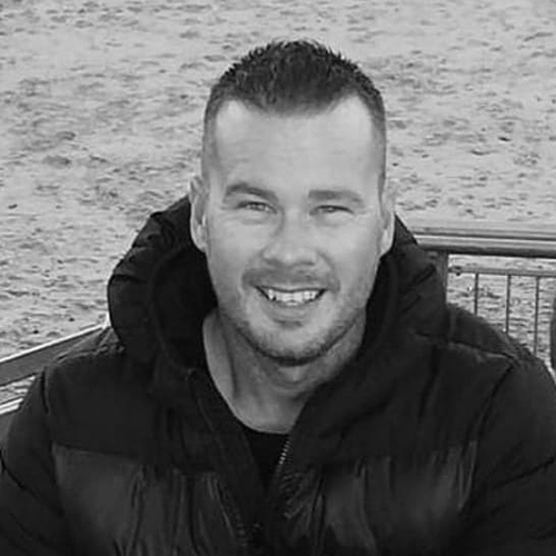 659c25aff139e997633559d4_Neil Headshot-p-500